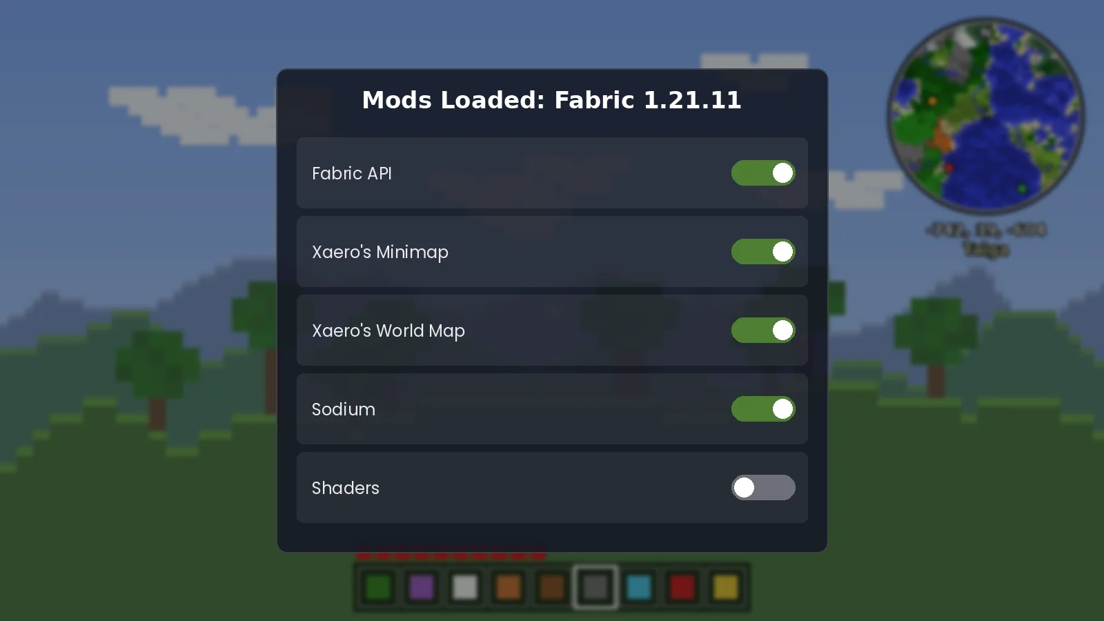 In-game mod list showing Fabric API, Xaero's Minimap and Xaero's World Map loaded on Fabric 1.21.11